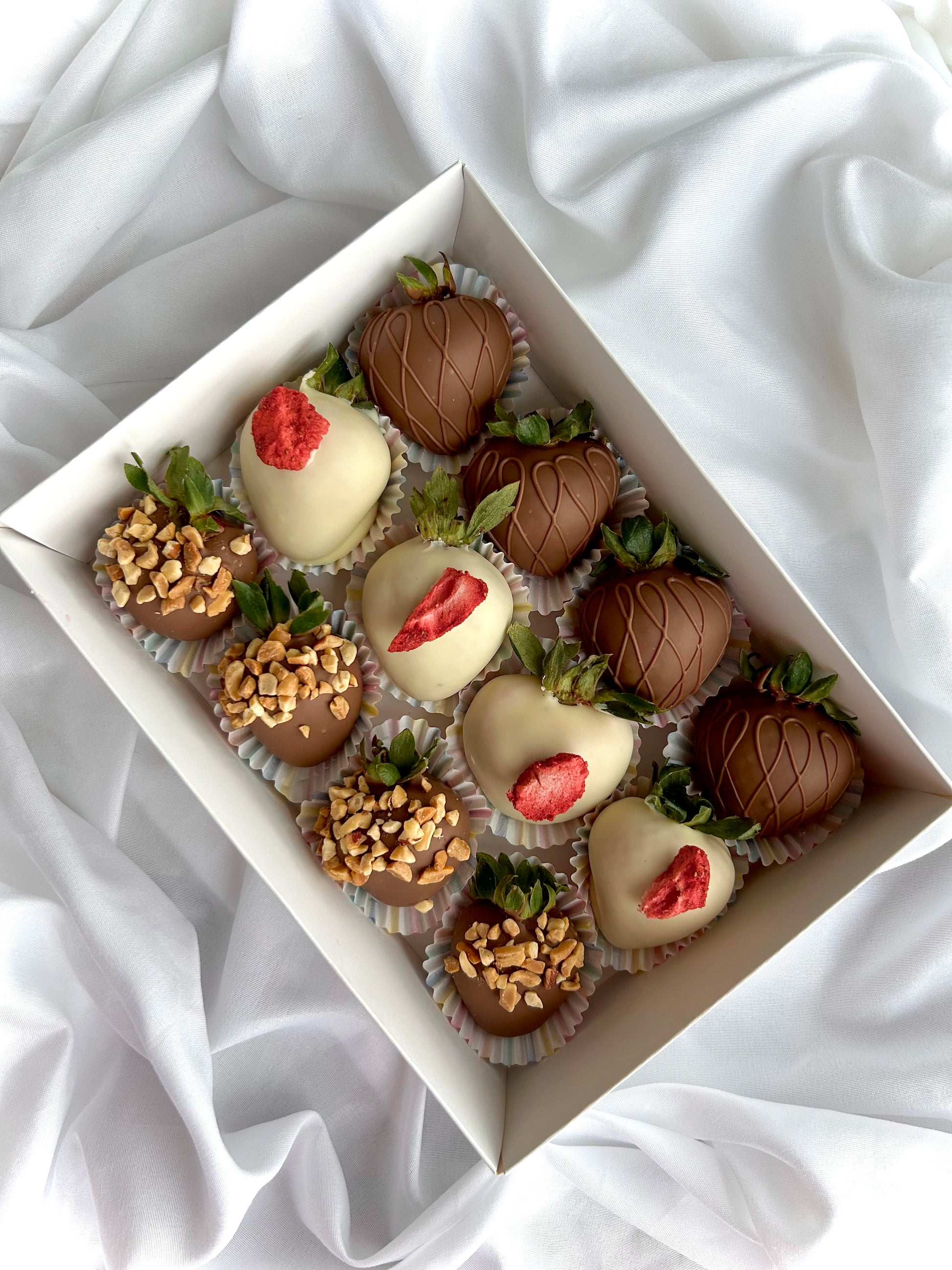 chocolate covered strawberries in white box,  white background