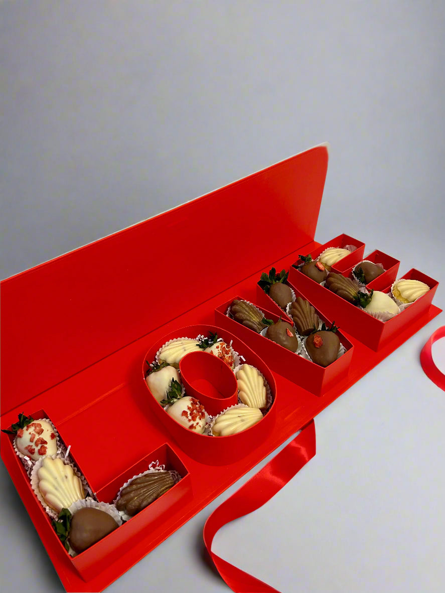 love luxury box with sweets inside on grey background