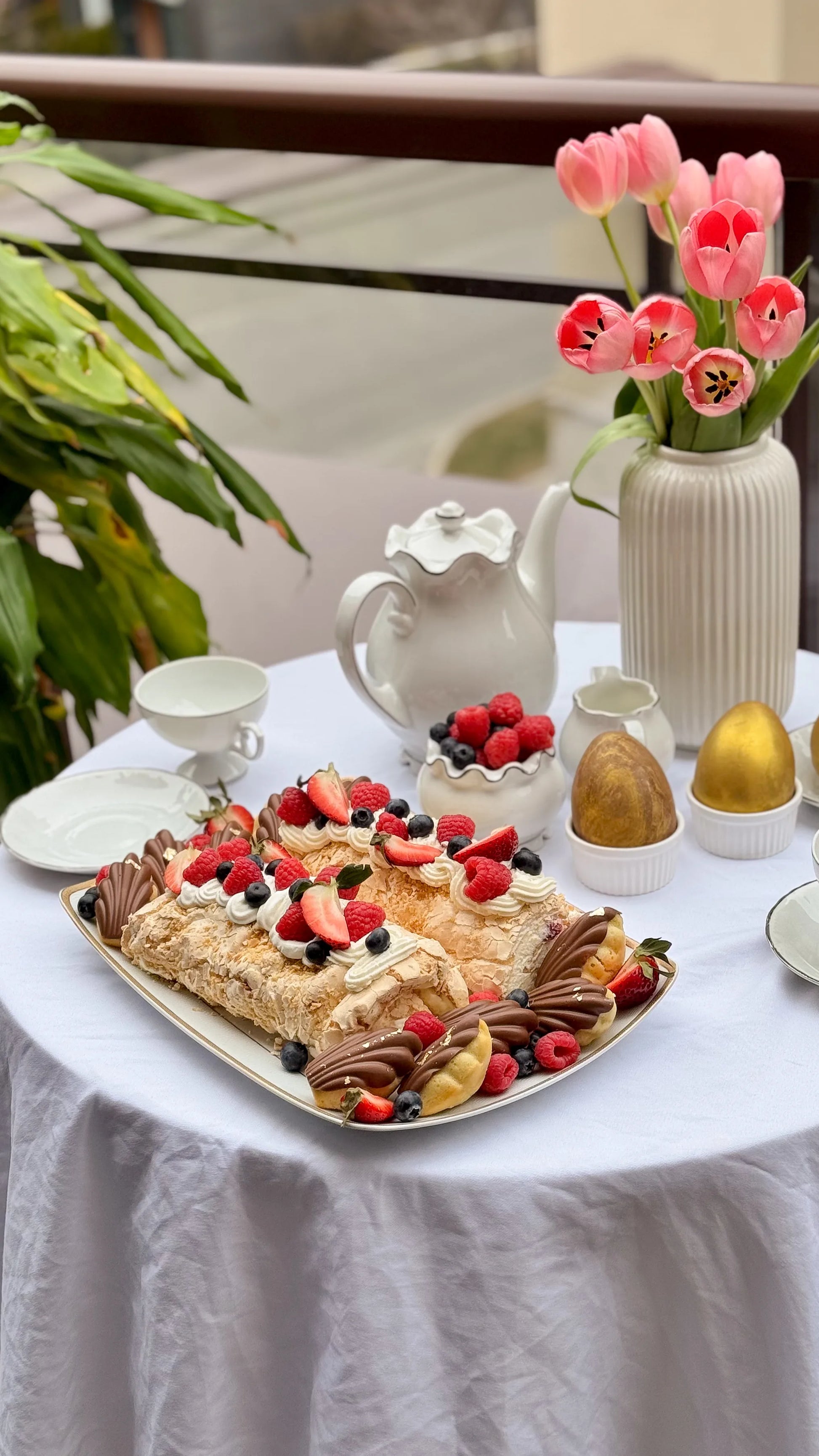 Handcrafted meringue roulade filled with mascarpone cream and fresh berries